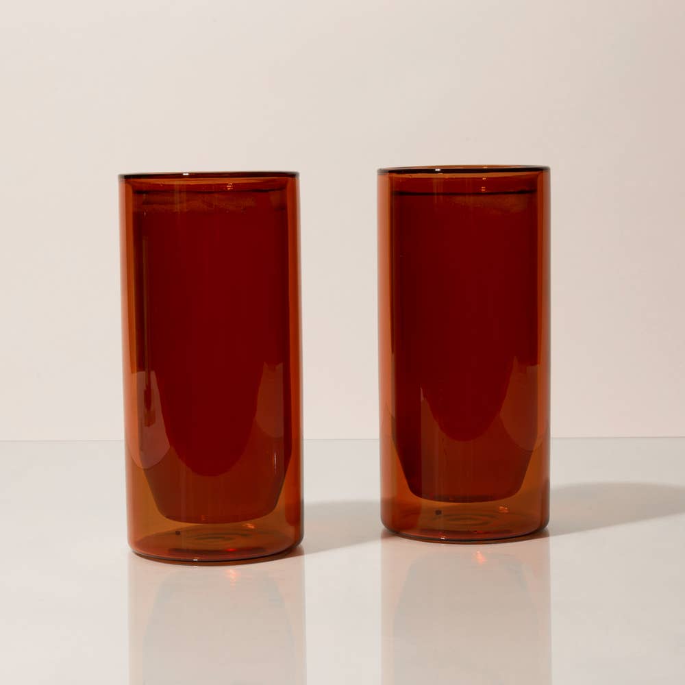The Amber-colored double-wall 16 oz glasses by Yield