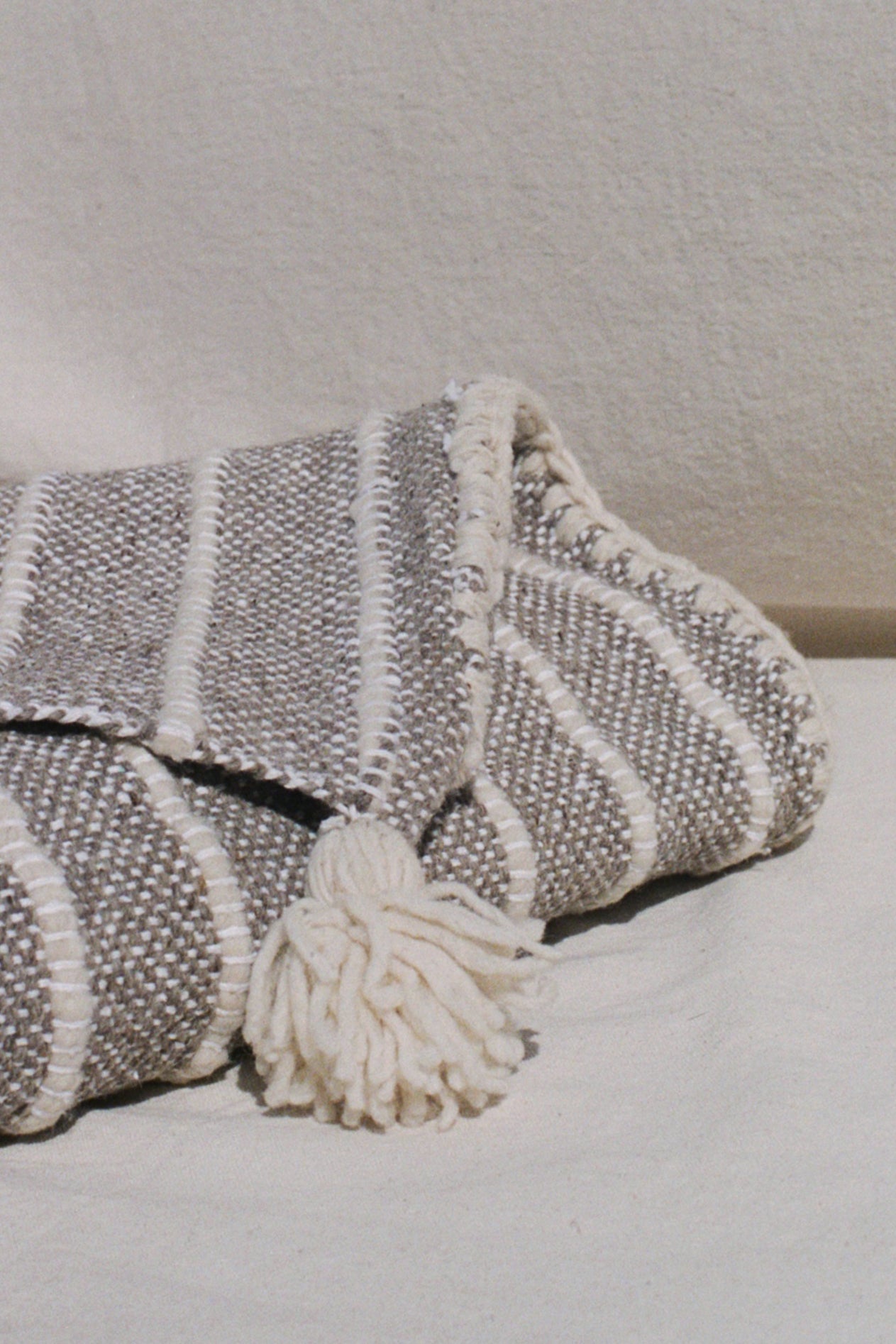 Stripe blanket with Pom Poms by Mexchic