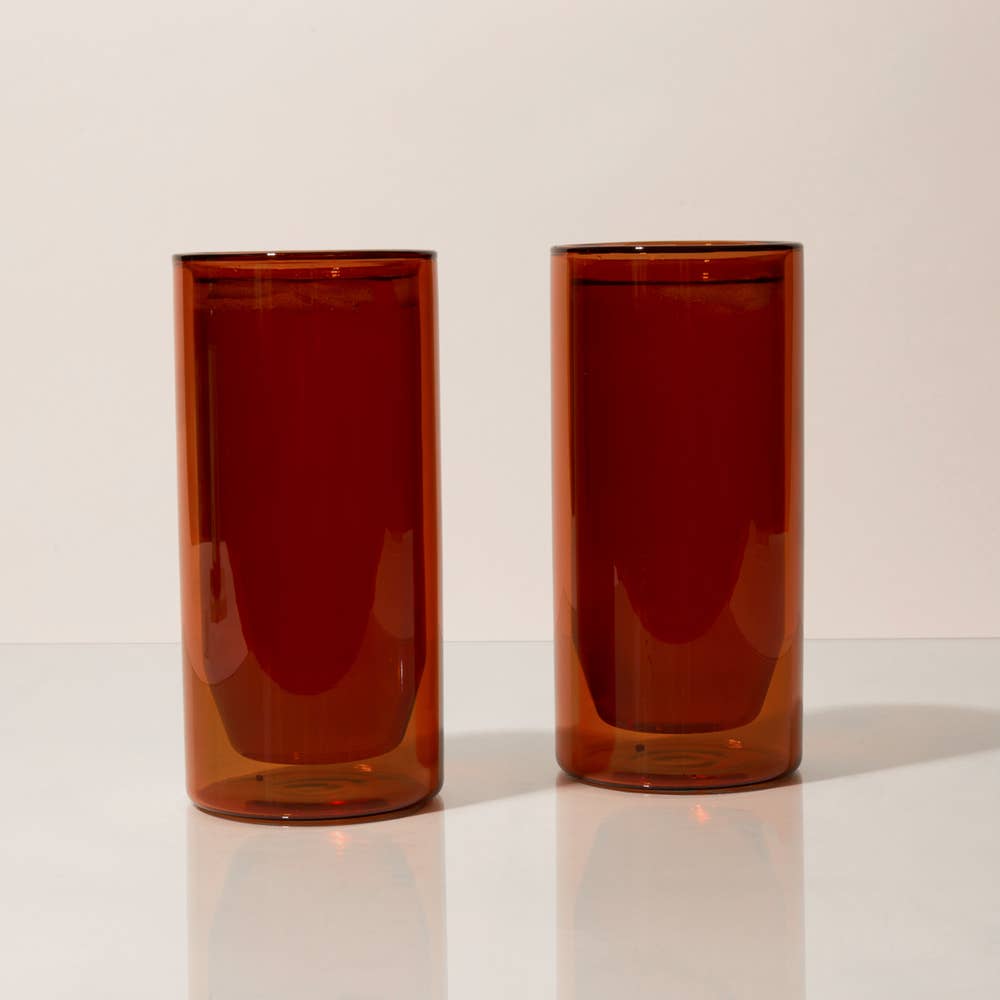The Amber-colored double-wall 16 oz glasses by Yield 