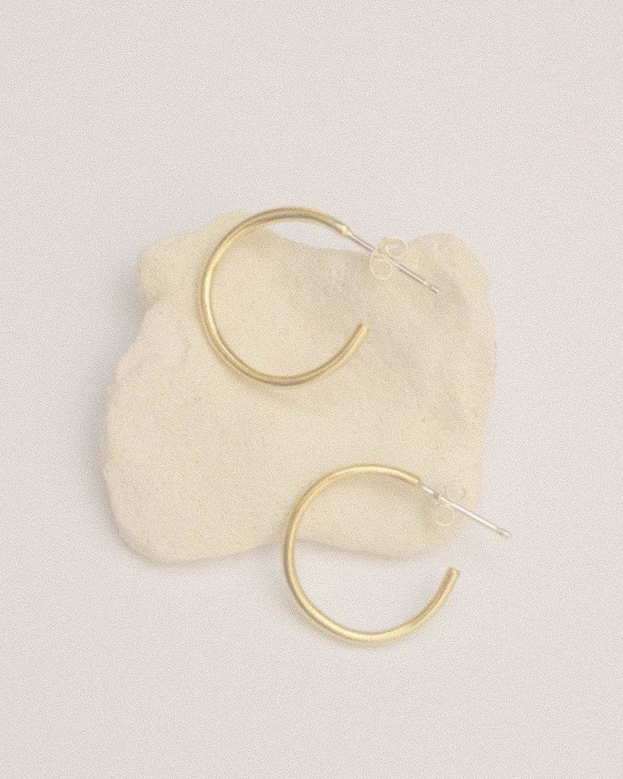 Brass Full Moon Mini Hoop Earrings by Moneh Brisel
