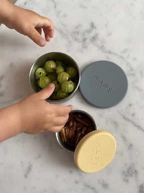 The Steel Trio Containers in Ocean and Sunlight by Haps Nordic